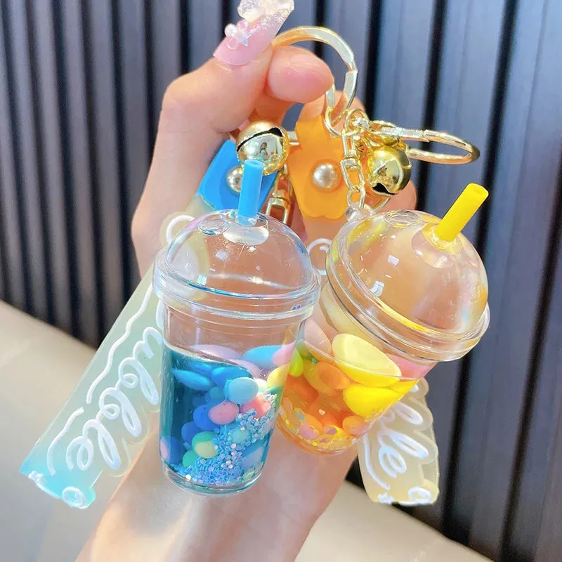 ✨ Adorable Quicksand Jelly Bean Keychain 🌈 - Whimsical Liquid Pearl Milk Tea Pendant for Trendy Bags & Keys! 🎀