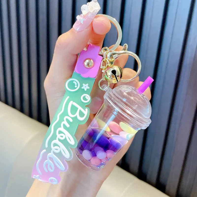 ✨ Adorable Quicksand Jelly Bean Keychain 🌈 - Whimsical Liquid Pearl Milk Tea Pendant for Trendy Bags & Keys! 🎀