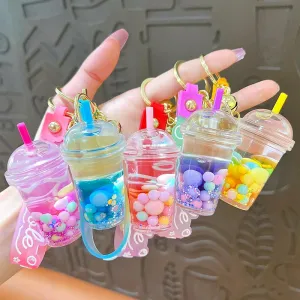 ✨ Adorable Quicksand Jelly Bean Keychain 🌈 - Whimsical Liquid Pearl Milk Tea Pendant for Trendy Bags & Keys! 🎀