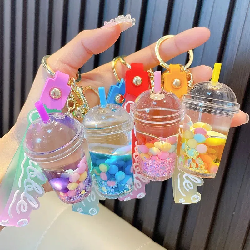 ✨ Adorable Quicksand Jelly Bean Keychain 🌈 - Whimsical Liquid Pearl Milk Tea Pendant for Trendy Bags & Keys! 🎀
