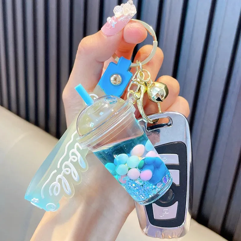 ✨ Adorable Quicksand Jelly Bean Keychain 🌈 - Whimsical Liquid Pearl Milk Tea Pendant for Trendy Bags & Keys! 🎀