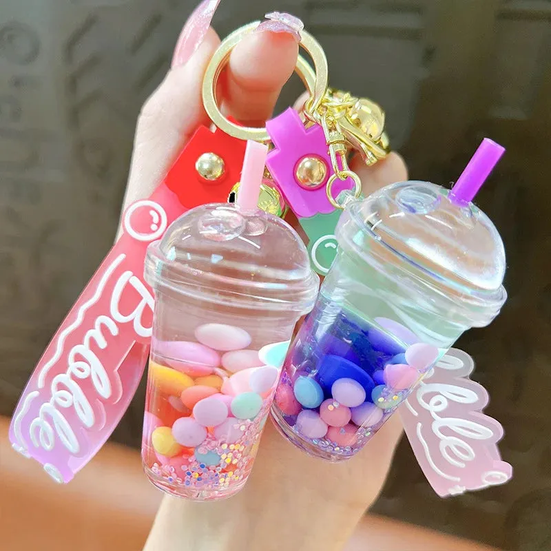 ✨ Adorable Quicksand Jelly Bean Keychain 🌈 - Whimsical Liquid Pearl Milk Tea Pendant for Trendy Bags & Keys! 🎀