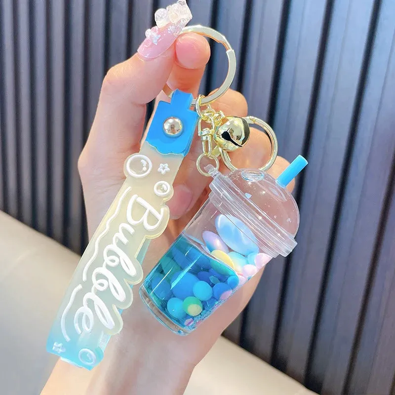 ✨ Adorable Quicksand Jelly Bean Keychain 🌈 - Whimsical Liquid Pearl Milk Tea Pendant for Trendy Bags & Keys! 🎀