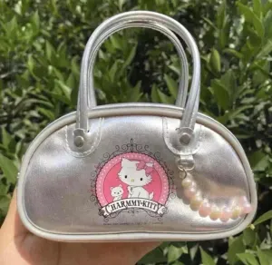 Charmmy Kitty Hand Bag with a shoulder strap