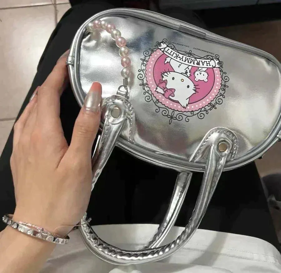 Charmmy Kitty Hand Bag with a shoulder strap
