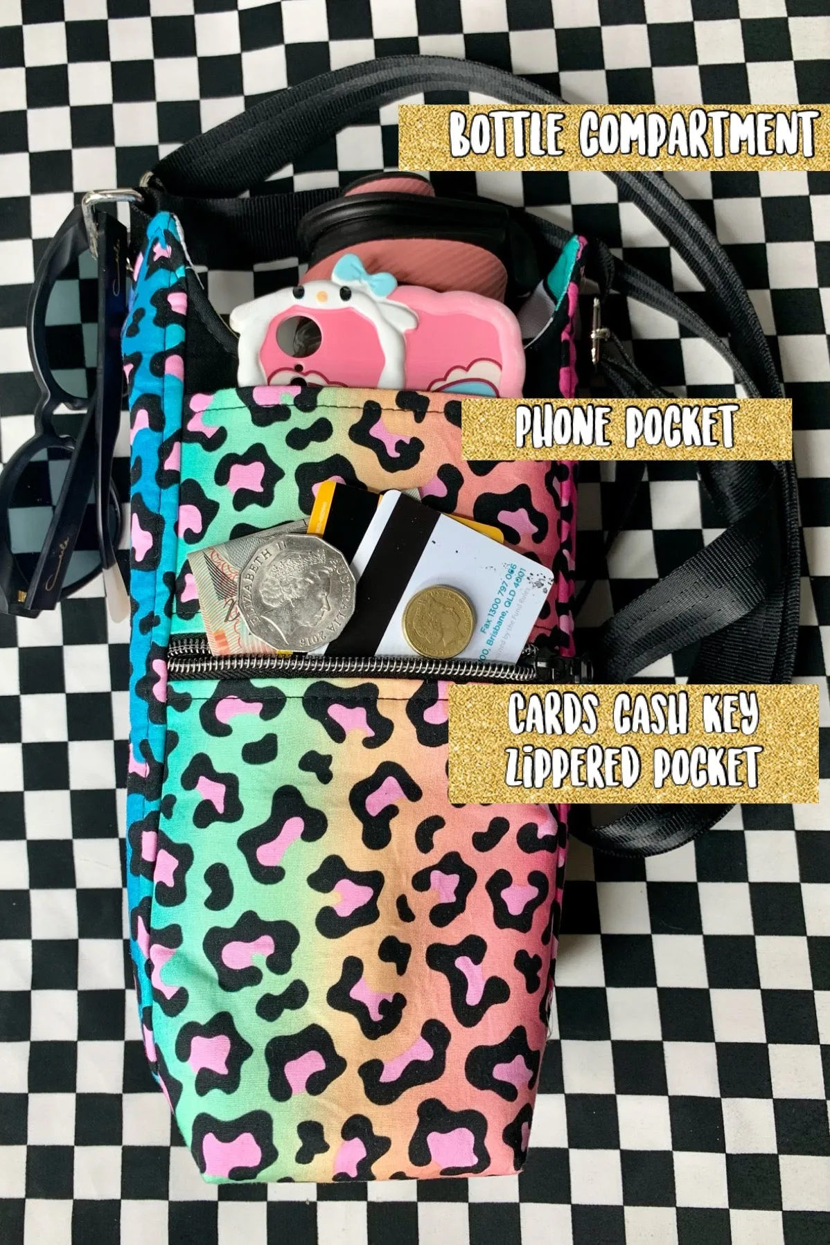 Cherries on black print drink bottle crossbody bag