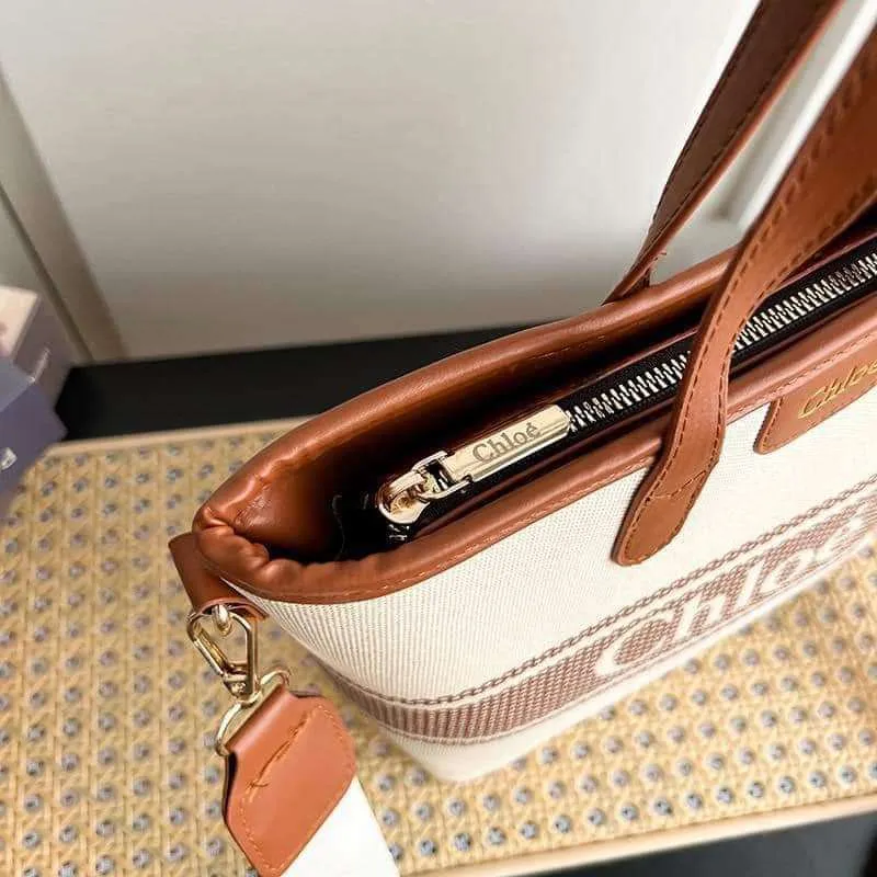 Hand & sling bag w/ dust bag