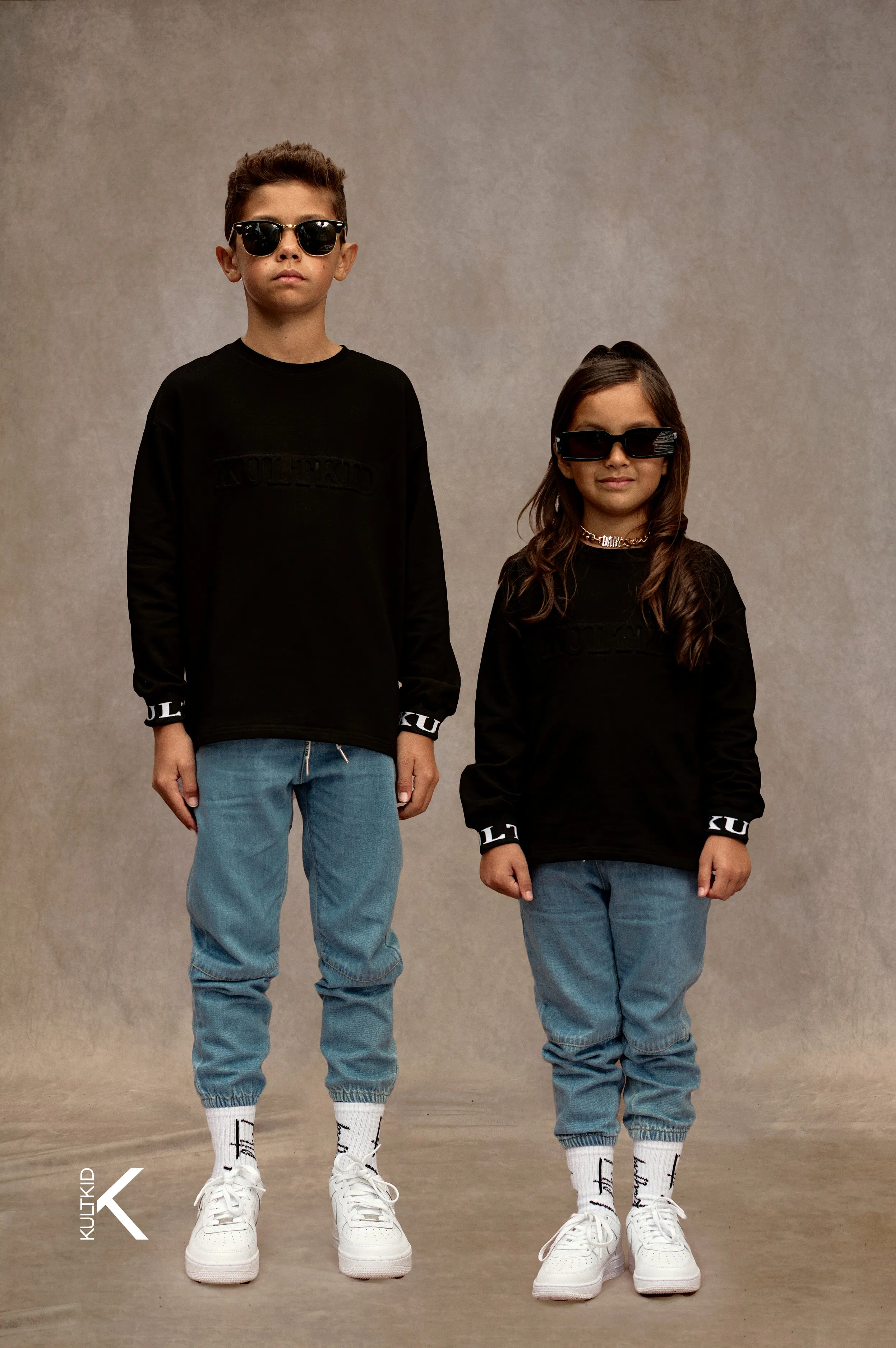 Oversized Logo Embossed Jumper in Space Black