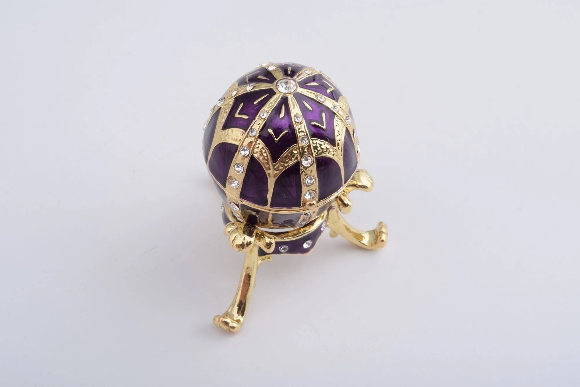 Purple Faberge Style Egg with an Egg Pendant Inside