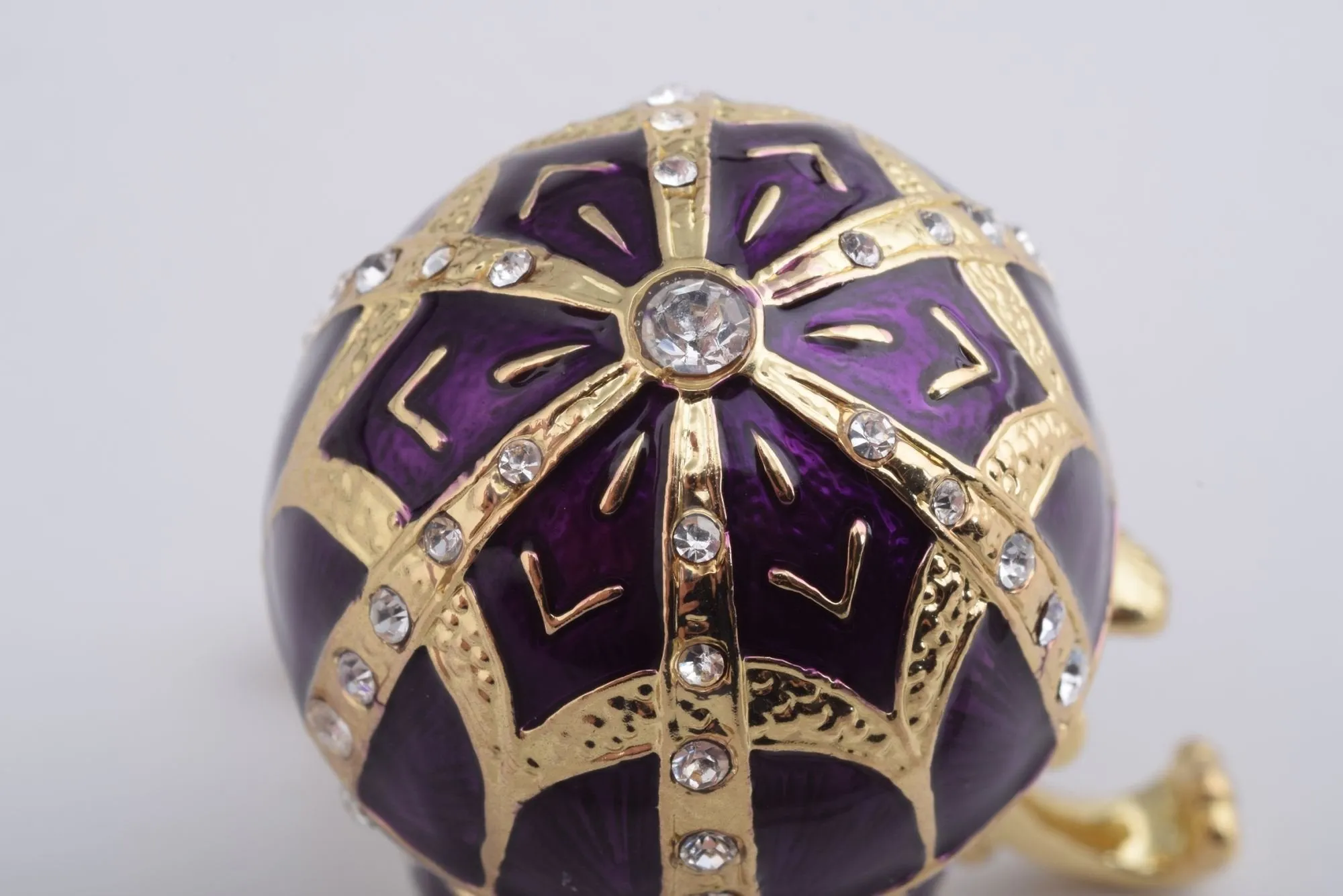 Purple Faberge Style Egg with an Egg Pendant Inside