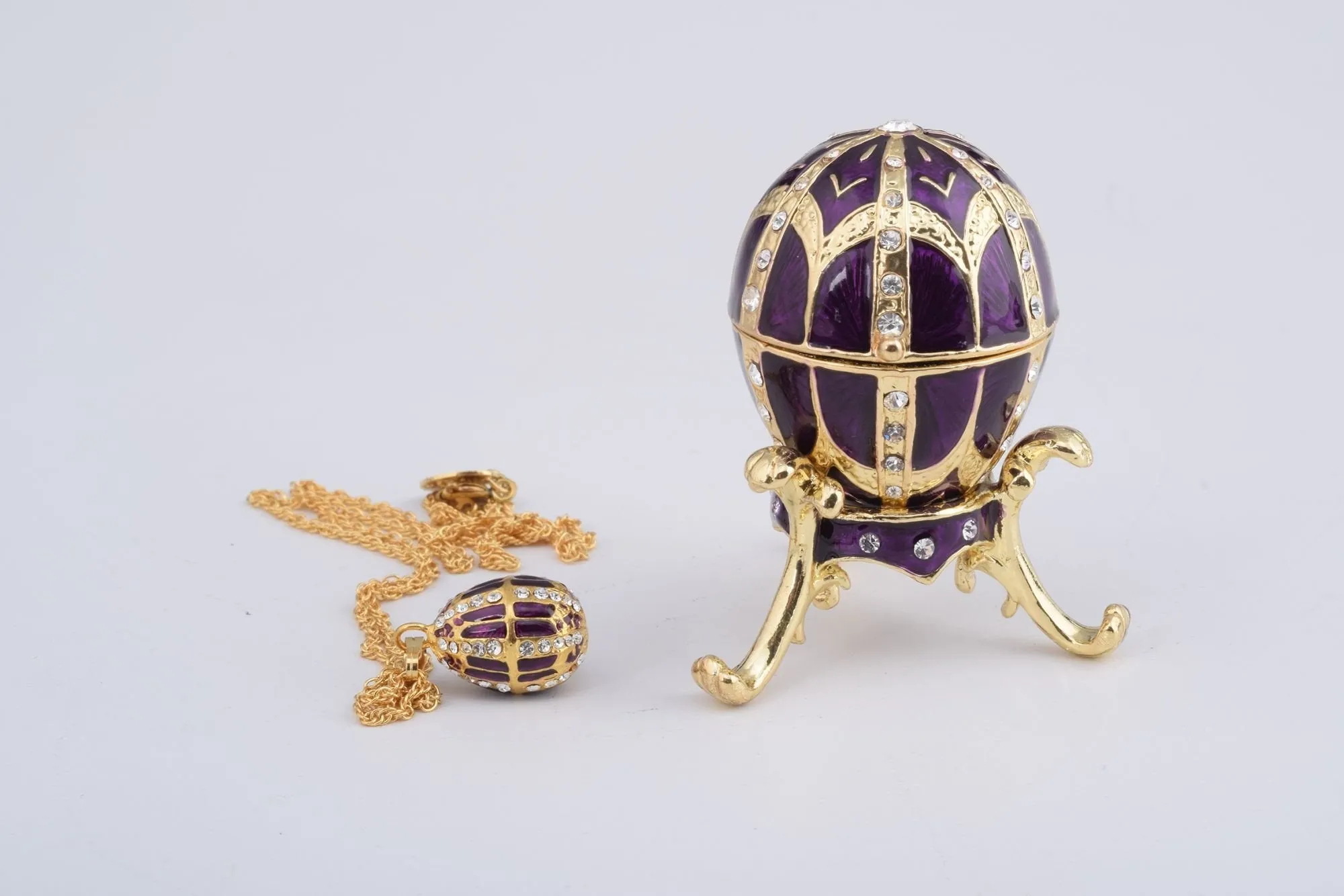Purple Faberge Style Egg with an Egg Pendant Inside