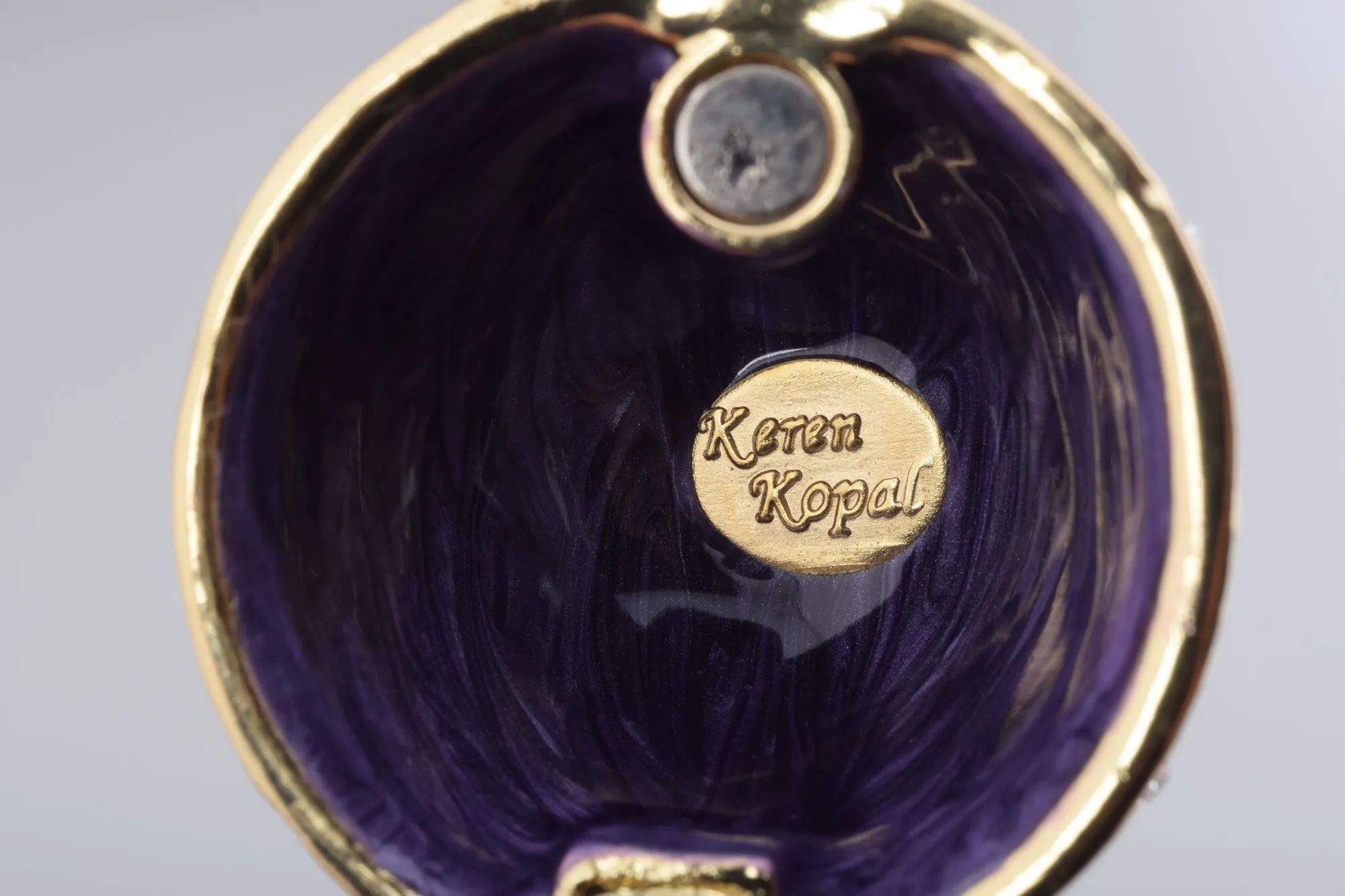 Purple Faberge Style Egg with an Egg Pendant Inside