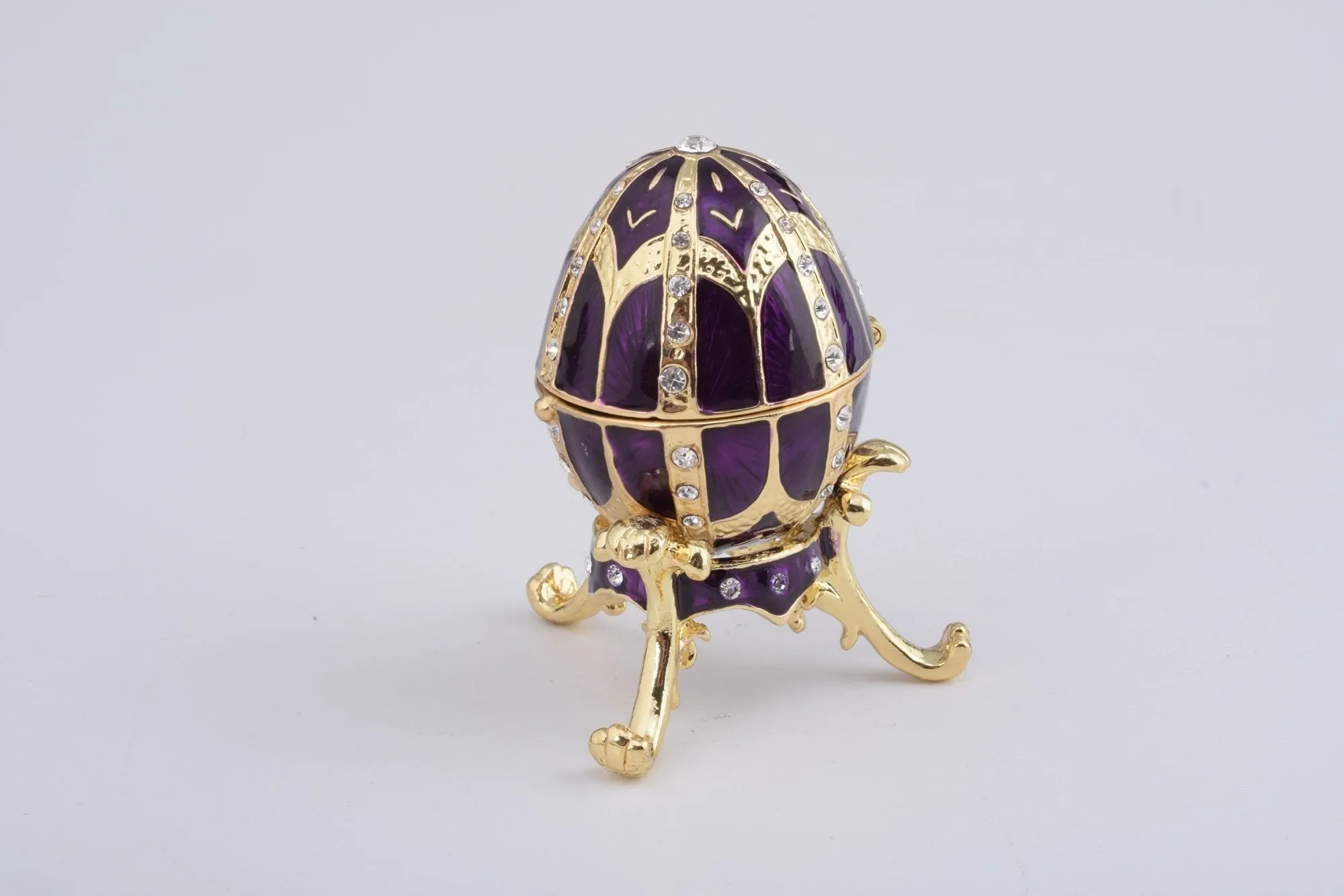 Purple Faberge Style Egg with an Egg Pendant Inside