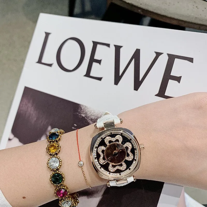 Rotatable Dial Four-Leaf Pattern Women's Watch