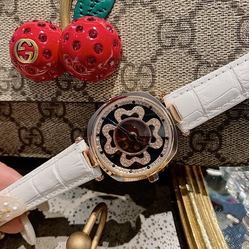 Rotatable Dial Four-Leaf Pattern Women's Watch