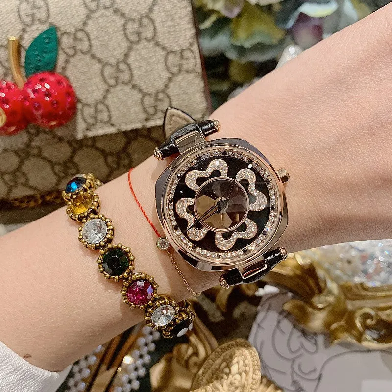 Rotatable Dial Four-Leaf Pattern Women's Watch