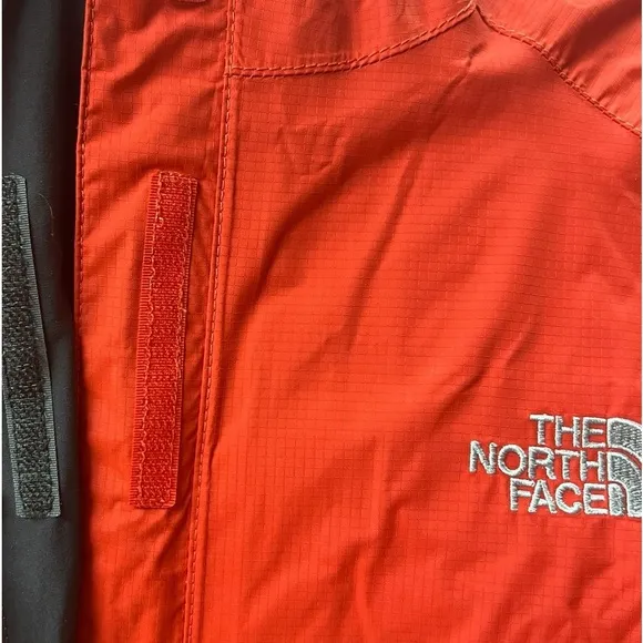 The North Face women’s red zip up with velcro zipper cover waterproof sizemedium